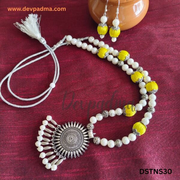 Handcrafted Silk Thread Necklace Set with Oxidized Sunburst Pendant – Yellow & White - Image 2